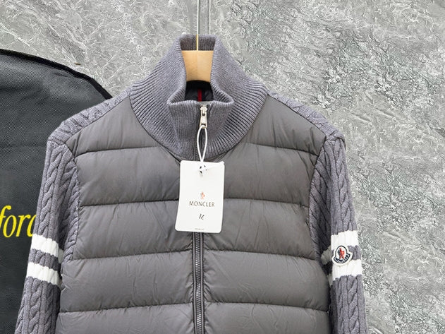 Moncler long puffer jacket front close-up with quilted gray body