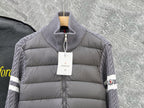 Moncler long puffer jacket front close-up with quilted gray body