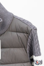 Moncler long puffer jacket side view with quilted gray padded lining