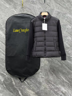 Moncler long black puffer jacket with full zip and stand collar, front view