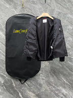 Moncler long black puffer jacket showing back view on hanger