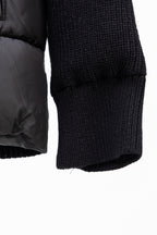 Moncler long black puffer jacket sleeve end with knit cuff