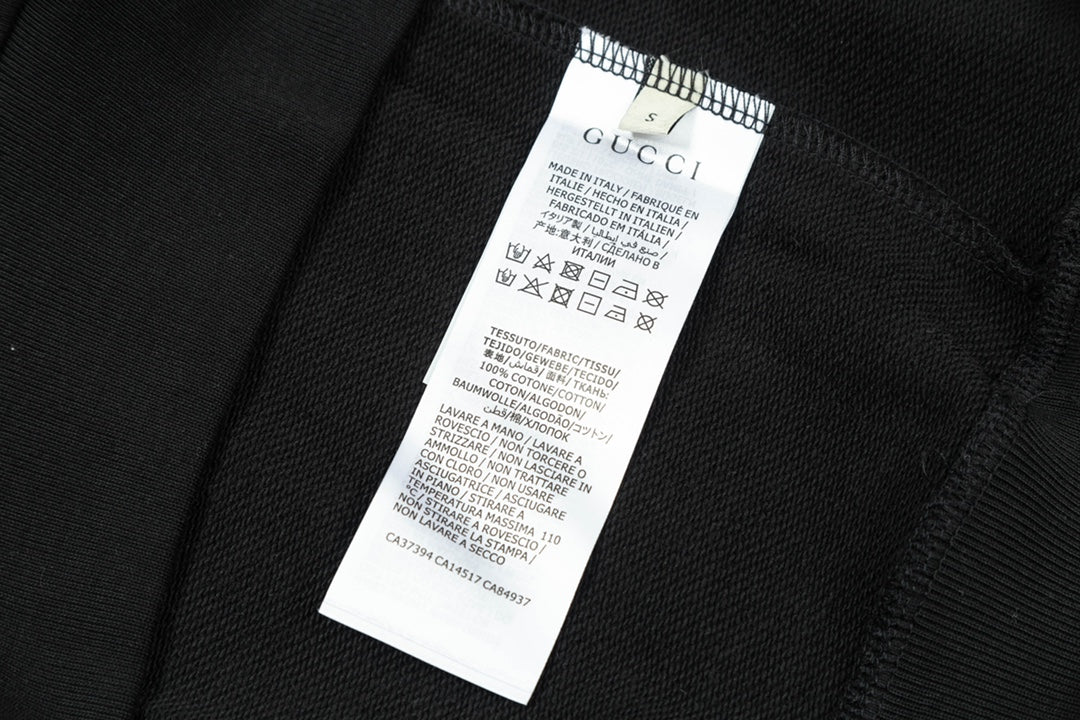 Black hoodie interior neck care label