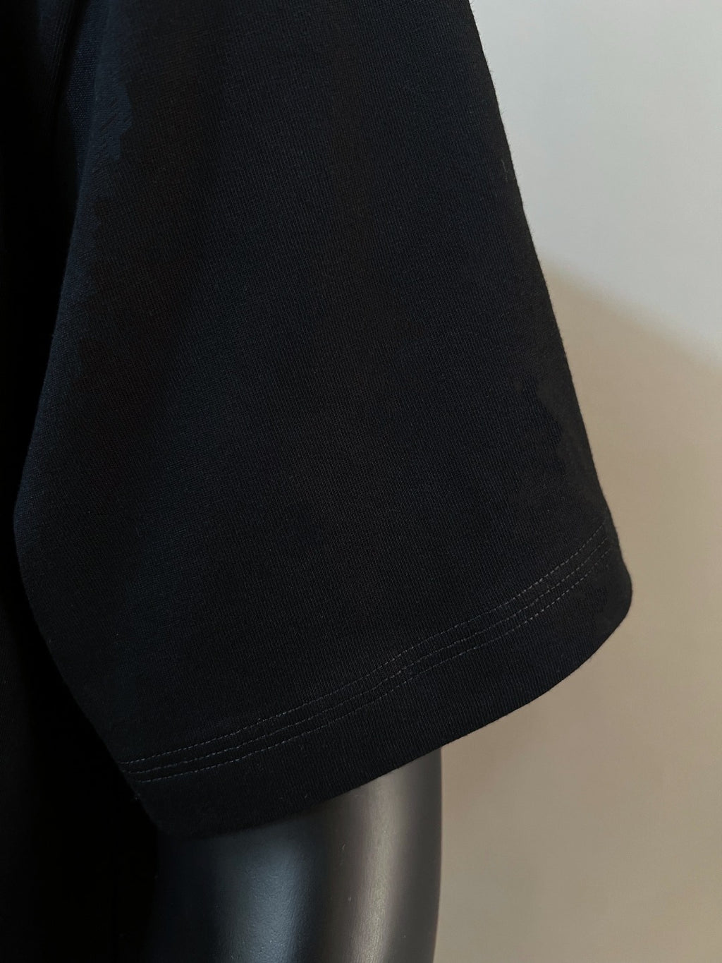 Polo Ralph Lauren black T-shirt sleeve hem with double-stitched edge
