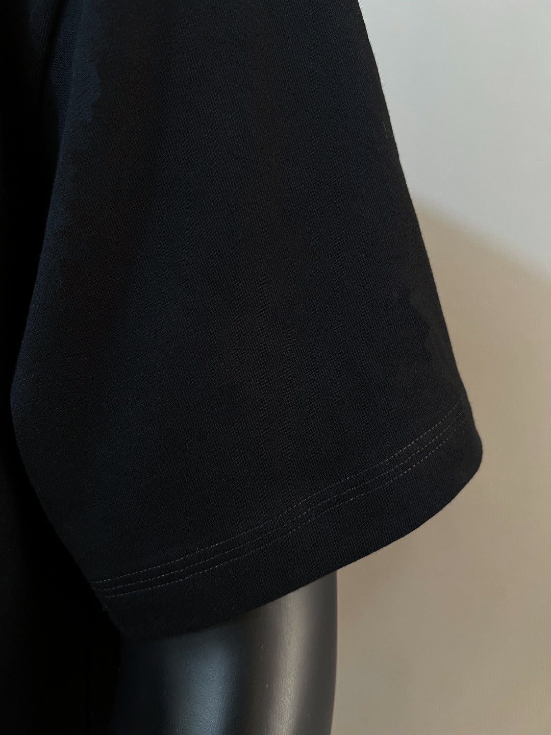 Polo Ralph Lauren black T-shirt sleeve hem with double-stitched edge