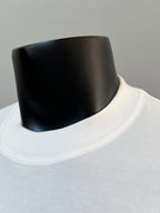 White crew-neck T-shirt collar close-up