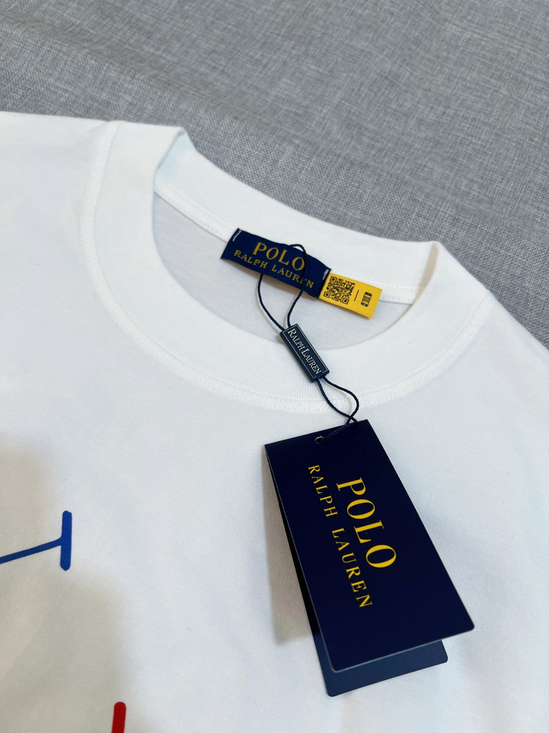 White T-shirt neckline with Polo Ralph Lauren label tag