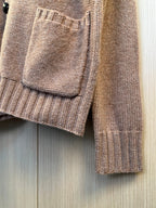 Brown knit cardigan pocket detail and ribbed knit sleeve cuff