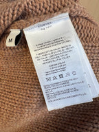 Brown knit cardigan interior care label with size M