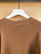 Brown knit cardigan crew neck with ribbed collar and textured knit