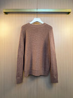 Brown knit cardigan back view with ribbed cuffs and hem