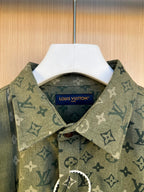 Long-sleeve shirt collar and placket in dark green monogram print with button and tag