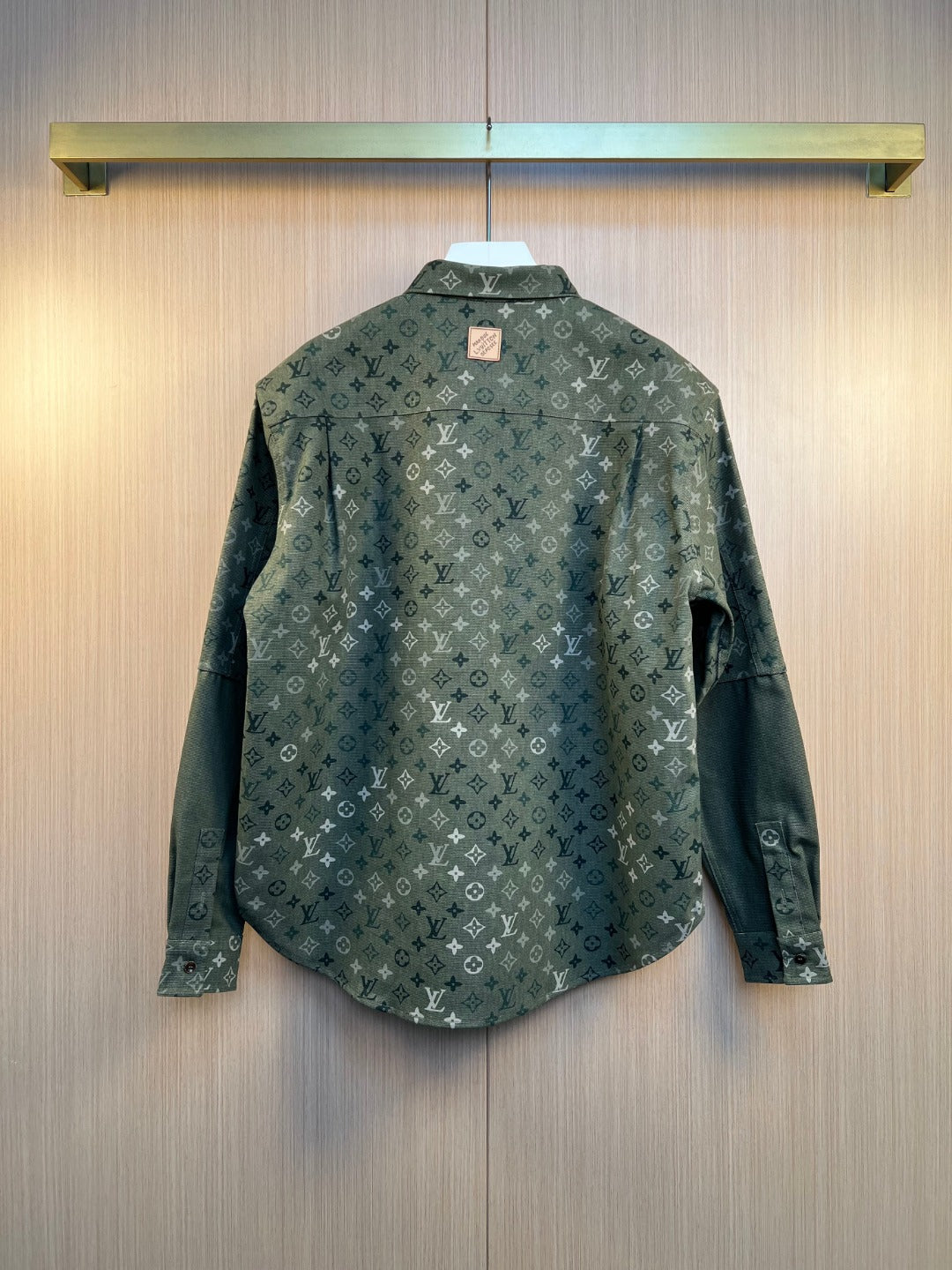 Back view long-sleeve button-up shirt in dark green monogram print
