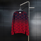 Dark navy knit sweater with red GG monogram pattern, crew neck, long sleeves.