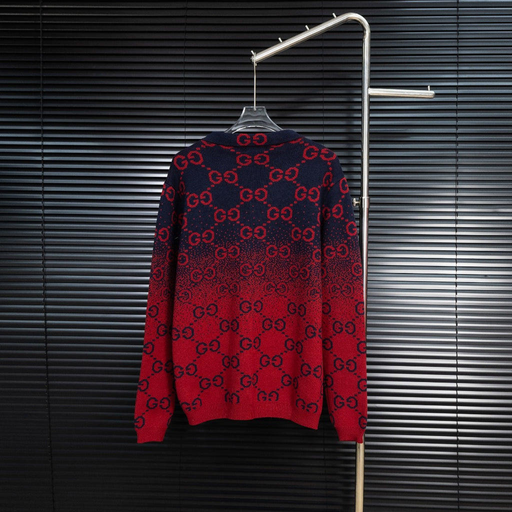 Dark navy knit sweater with red GG monogram all-over pattern, crew neck, long sleeves.