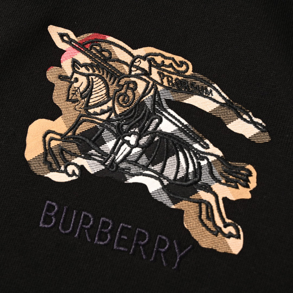 Black hoodie chest graphic with vintage illustration and BURBERRY text.