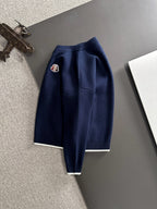 Moncler navy knit pullover with long sleeves and embroidered chest logo