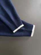 Moncler navy knit cuff with cream rib trim and sleeve edge