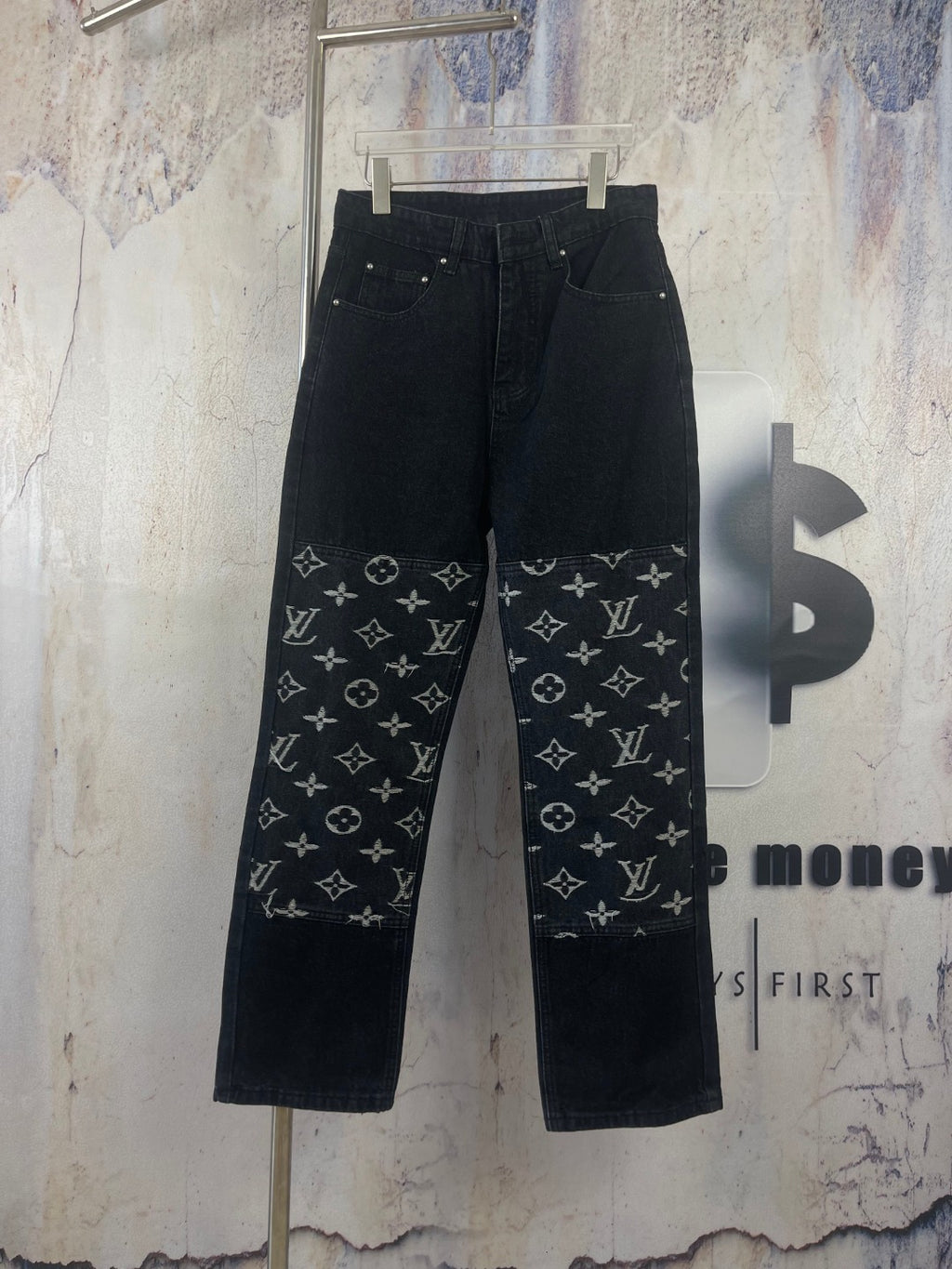 Black denim pants with white Louis Vuitton monogram print panels, button fly