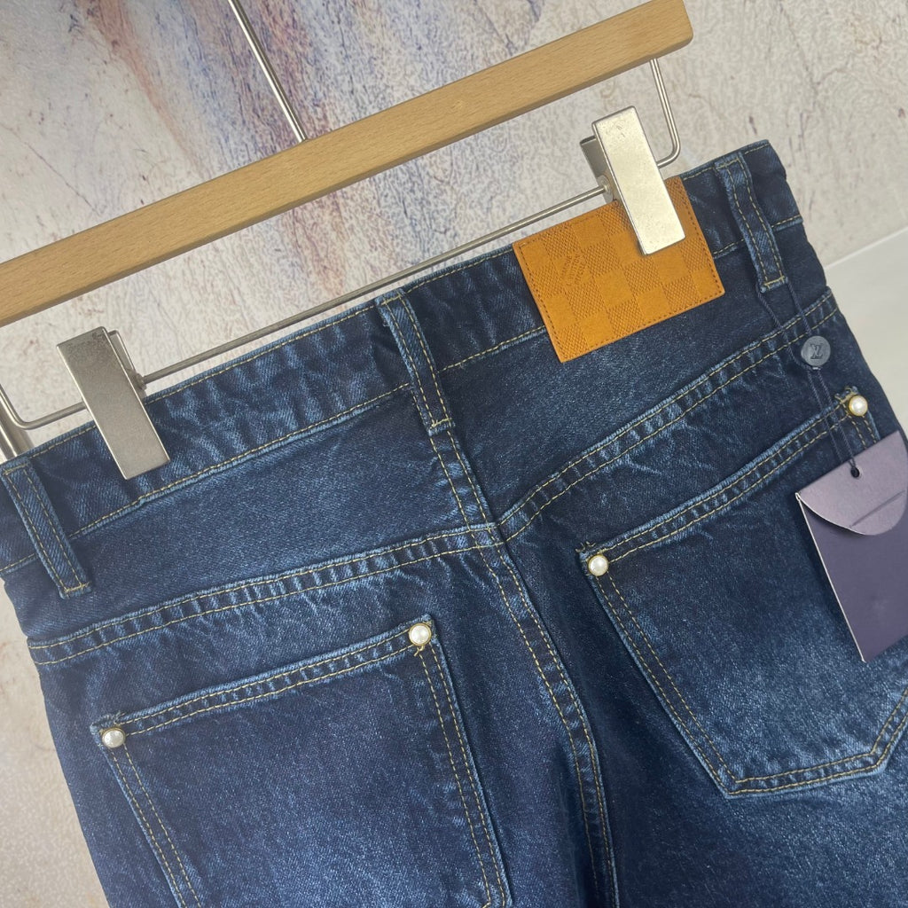 Louis Vuitton denim pants, front and back pocket details with yellow label accents