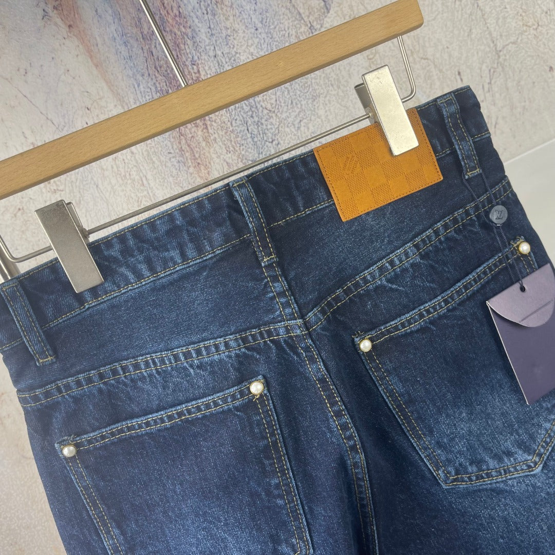 Louis Vuitton denim pants, front and back pocket details with yellow label accents