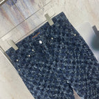Louis Vuitton pants, dark blue allover monogram print, laid flat