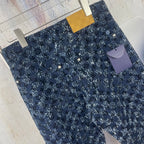 Louis Vuitton pants, dark blue patterned wide leg hanging on clips