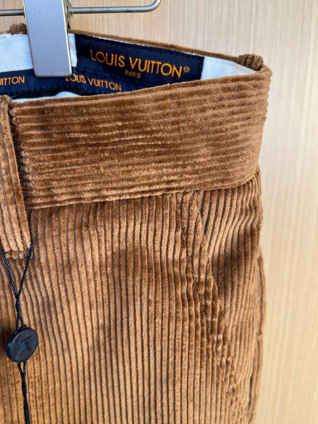 Corduroy pants waistband with branded interior label