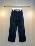Louis Vuitton dark denim pants with monogram applique on lower legs