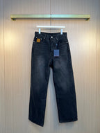 Dark denim pants with belt loops, button fly, and straight legs.