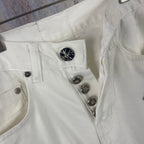 White denim pants front with metal buttons and belt loops