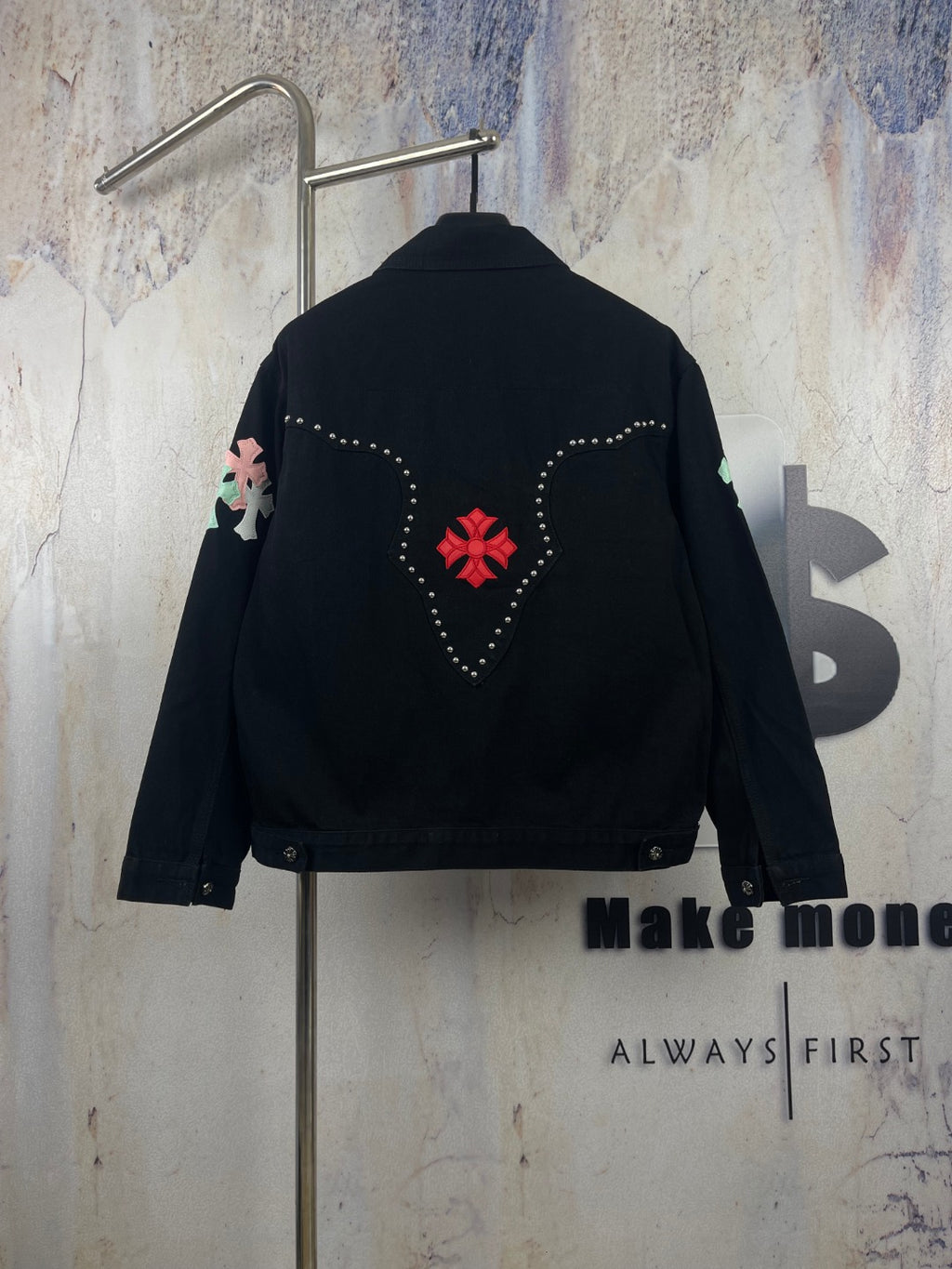 Black long-sleeve denim jacket back view with red heart graphic and rhinestones