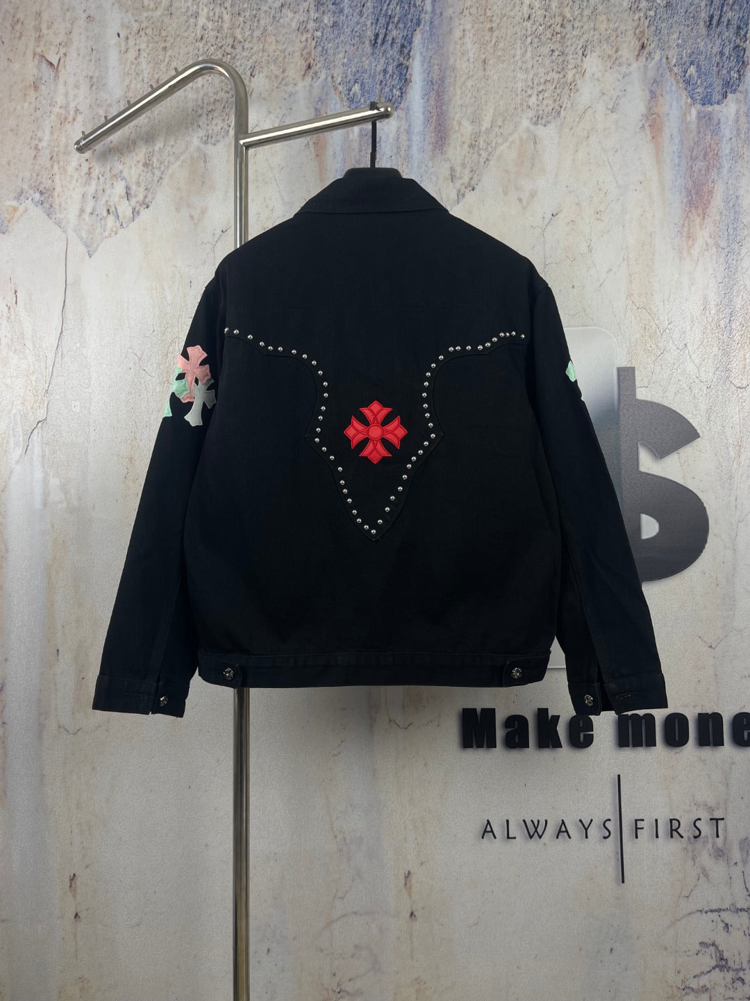 Black long-sleeve denim jacket back view with red heart graphic and rhinestones