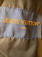 Louis Vuitton fabric label on inner side seam, with “Paris” text.