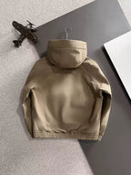 Lightweight hooded jacket in tan, back view with attached hood and elastic hem