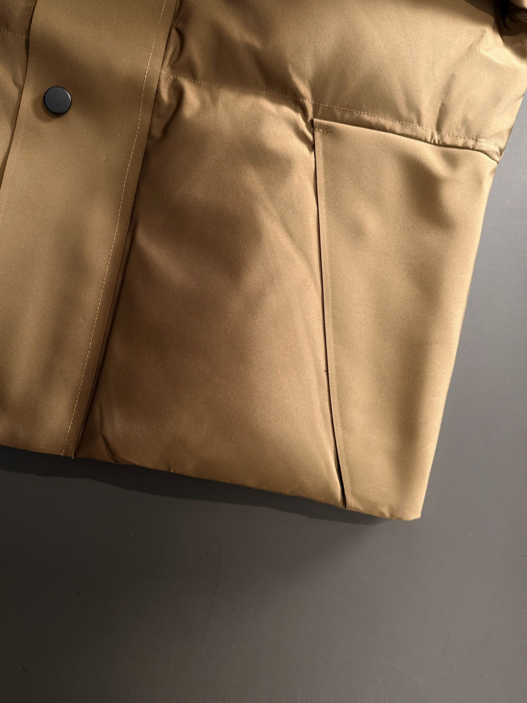 Moncler long puffer jacket lower front with dark buttons and side seam