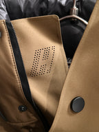 Moncler puffer jacket sleeve panel with dotted logo patch and dark button
