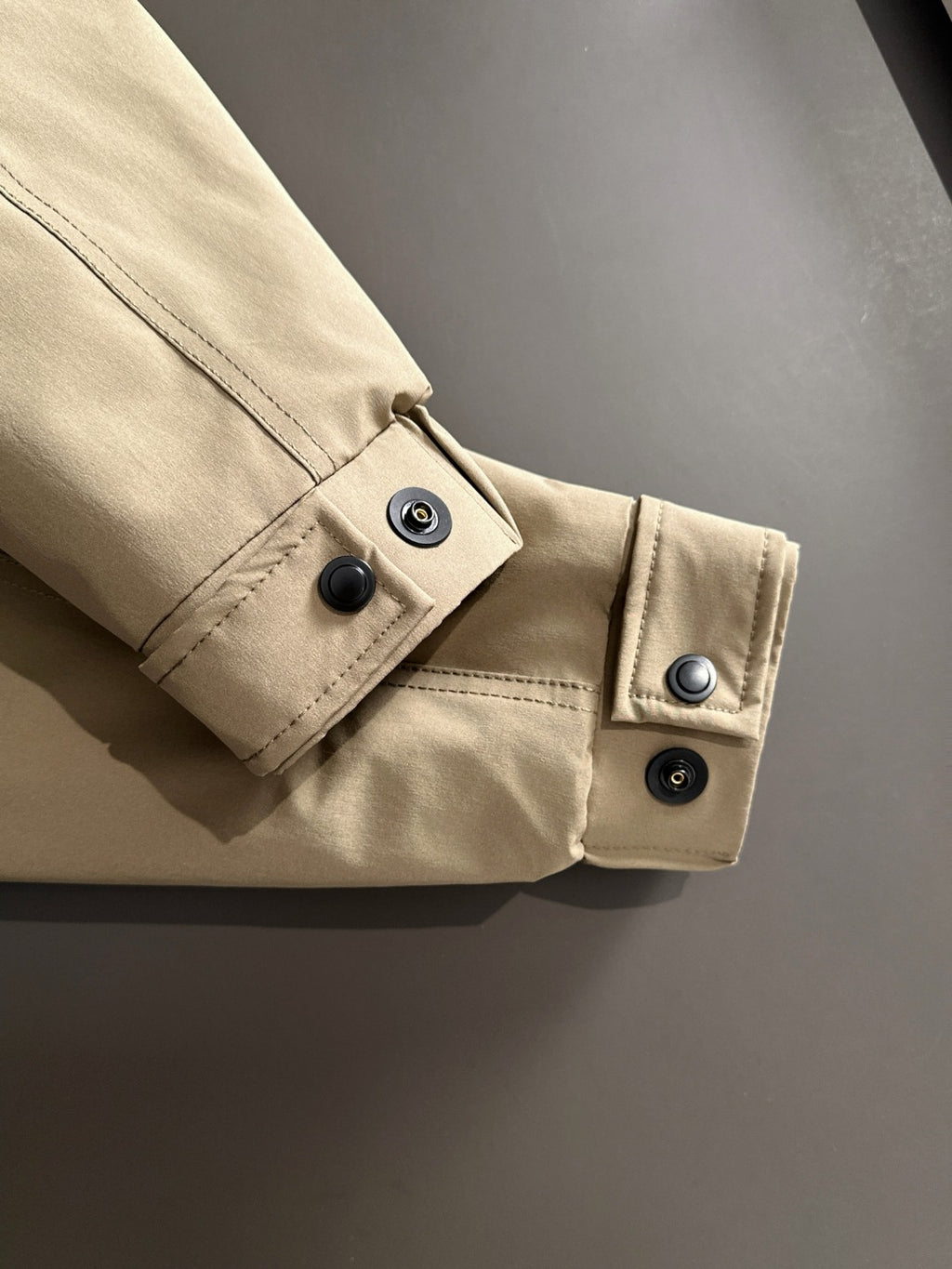 Fendi parka sleeve cuff in light tan with snap buttons and stitched placket