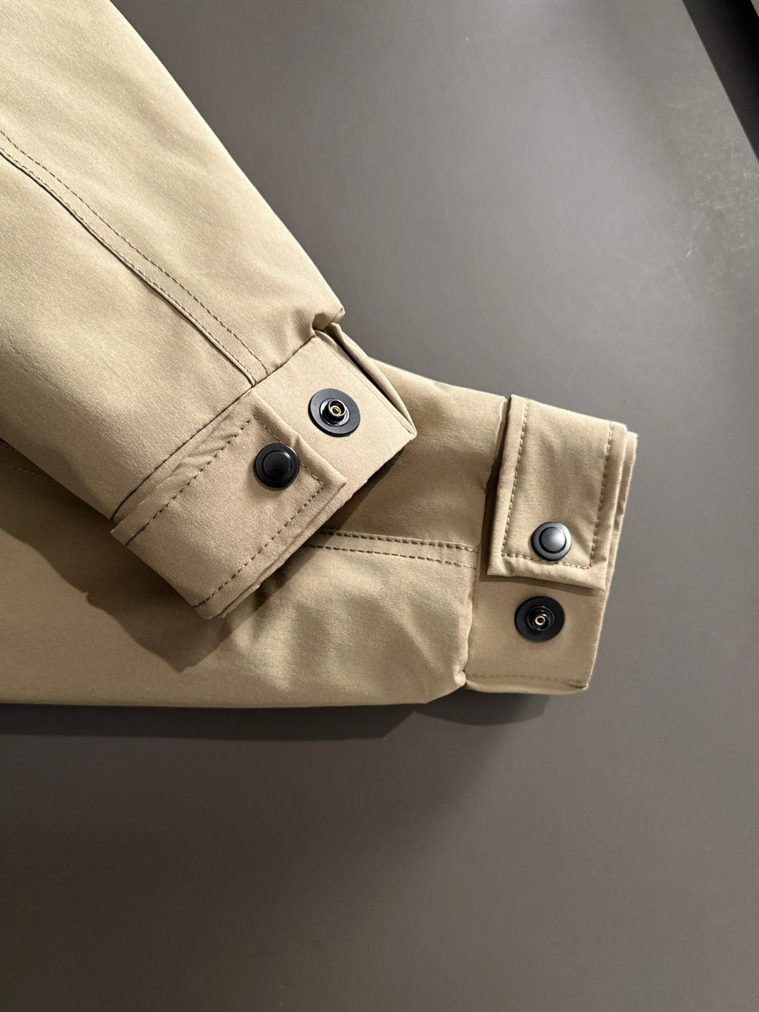 Fendi parka sleeve cuff in light tan with snap buttons and stitched placket