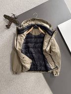 Fendi long parka with hood open to reveal black puffer lining and trim