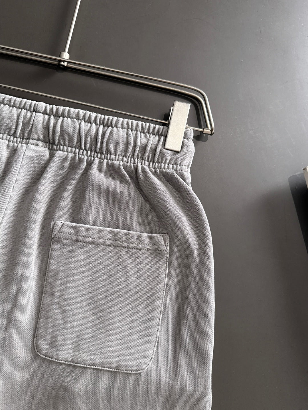 Stone Island light gray sweatpants with patch pocket and elastic waistband with drawcord