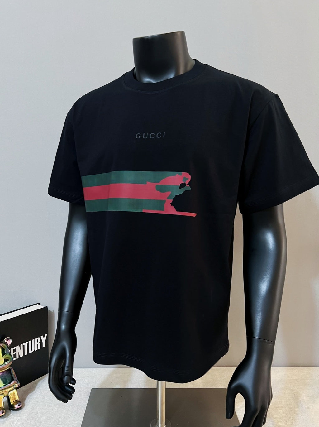 Black Gucci T-shirt with red and green graphic stripe, crew neck, short sleeves