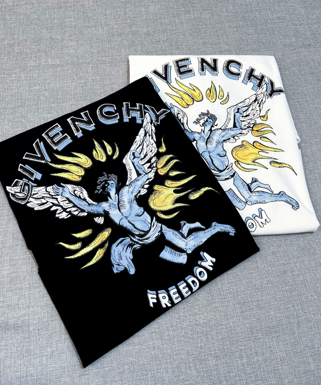 Givenchy T-shirt set with freedom angel graphic on folded shirts