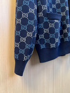Gucci knit cardigan sleeve and hem detail, navy GG monogram pattern cuff