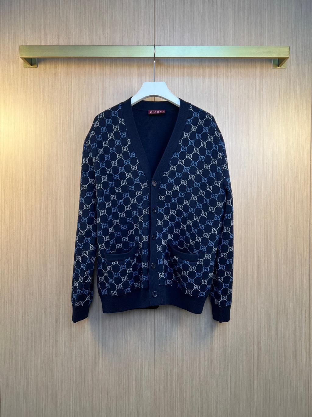 Gucci knit cardigan with navy GG monogram pattern, button-front V-neck
