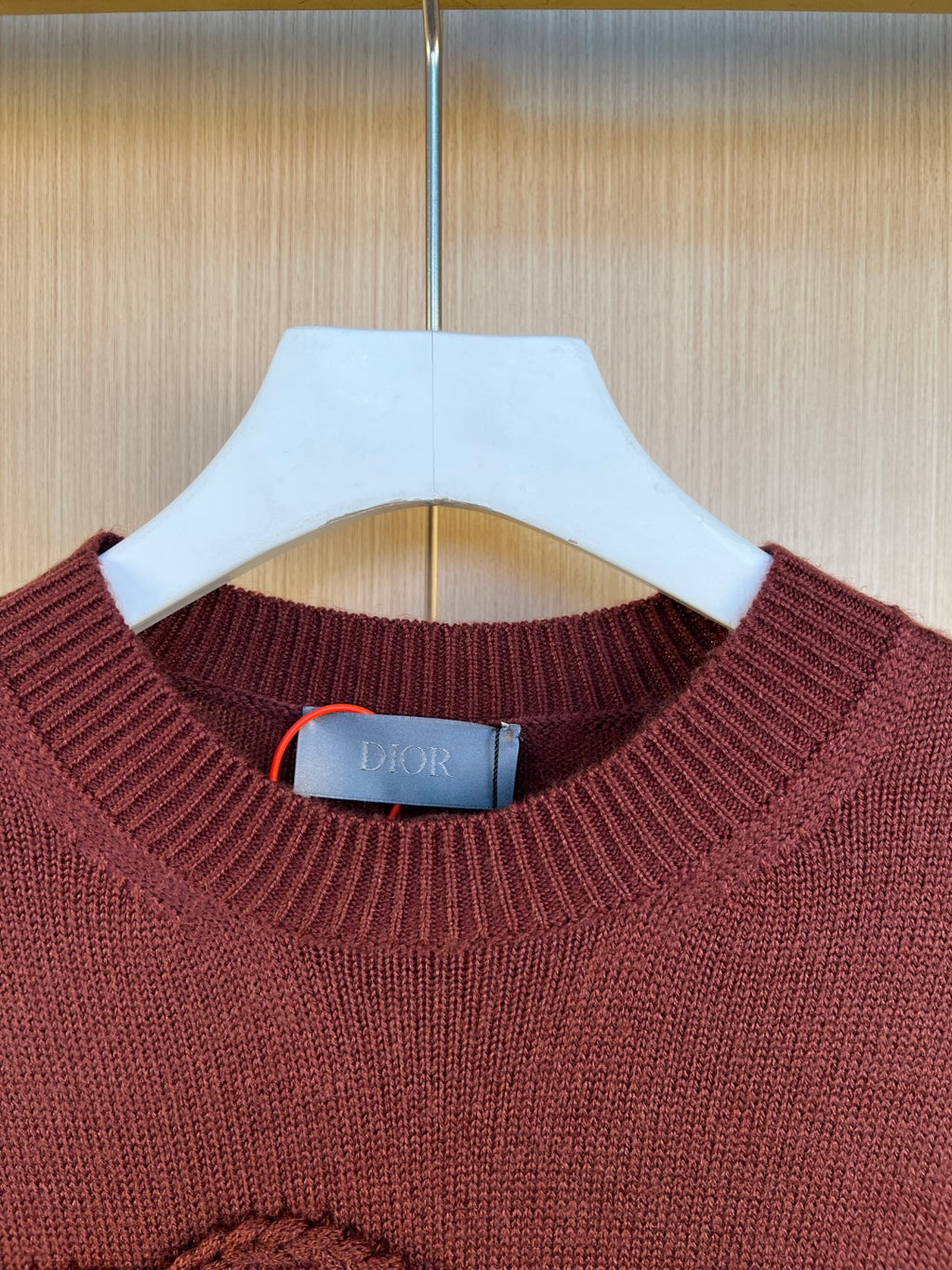Burgundy crewneck sweater with Dior logo label at neckline