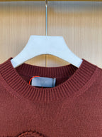 Burgundy crewneck sweater with Dior logo label at neckline