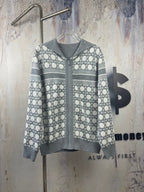 Gray zip-up hoodie with geometric pattern and striped sleeves