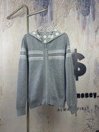 Gray zip-up hoodie back with horizontal stripe details and hood