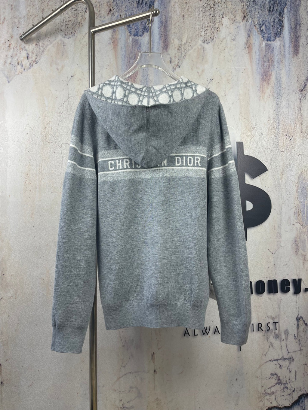 Gray zip-up hoodie back with Dior logo across chest and hood